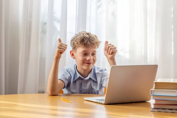 Excited Schoolboy Learning Online Laptop Desk Books Stationery — Stock Photo, Image