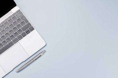 Top view business office desk with laptop. Flat lay workspace with copy space