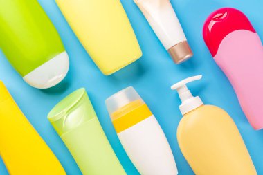 A vibrant collection of toiletry tubes, perfect for everyday personal care. Flat lay
