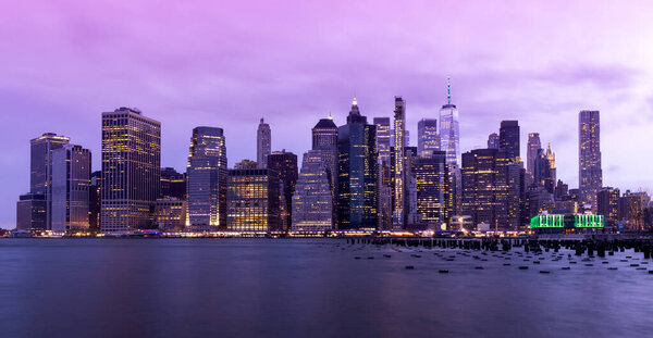 Manhattan skyline in New York, showcasing the impressive architecture and modern cityscape at night