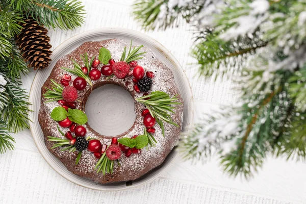 Christmas Cake Decorated Pomegranate Seeds Cranberries Rosemary Flat Lay — Stock Photo, Image