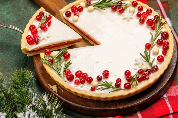 stock image Festive indulgence: Christmas cake adorned with berries and rosemary