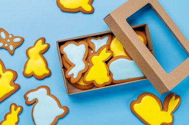 Easter sweetness: Adorable gingerbread cookies in festive shapes. Flat lay clipart