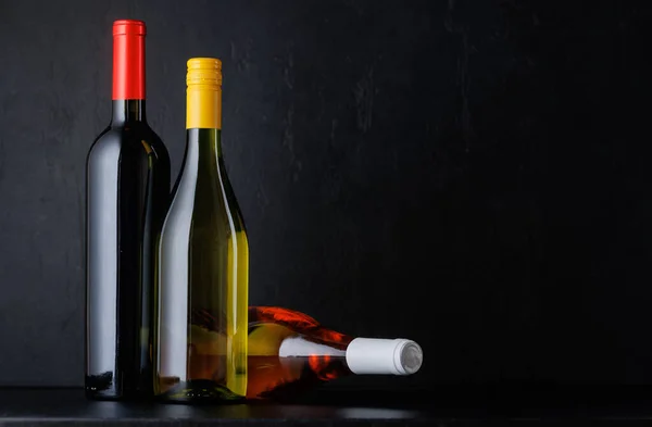 Various Wine Bottles Black Copy Space — Stock Photo, Image