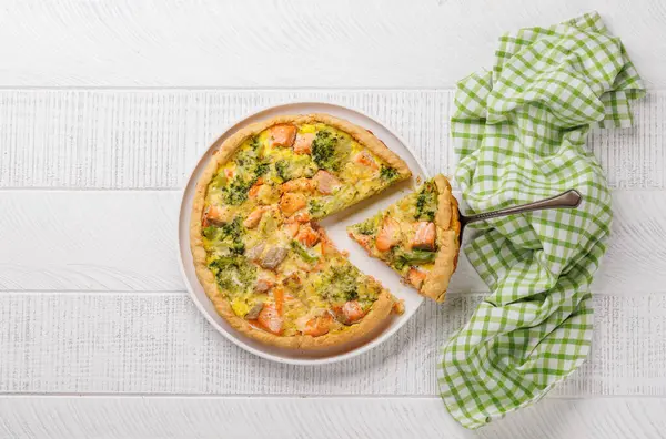 stock image Fresh fish homemade pie with salmon and broccoli. Flat lay