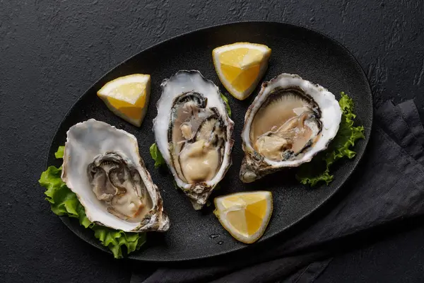 Fresh Oysters Lemon Plate Flat Lay Royalty Free Stock Images