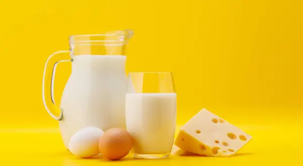 Pitcher Milk Eggs Yellow Background Copy Space Stock Image