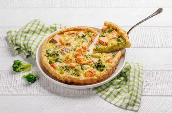 stock image Fresh fish homemade pie with salmon and broccoli