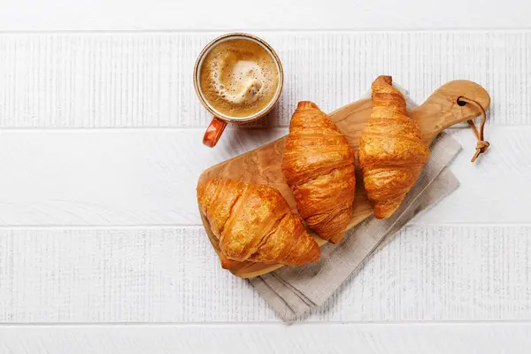 Fresh Croissants Wooden Board Royalty Free Stock Images