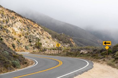 Asphalt road and mountain landscape. California State Route One