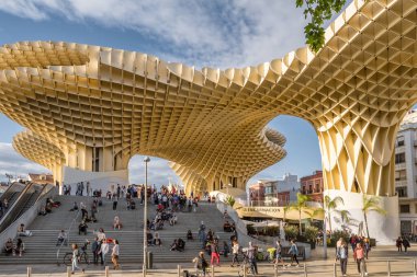 Seville, Spain - April 20, 2022: Metropol Parasol in Plaza de la Encarnacion in Sevilla, Spain. J. Mayer H. architects, it is made from bonded timber with a polyurethane coating.
