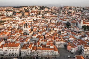 Aerial panoramic view of downtown of Lisbon, Portugal. Drone photo of the Lisbon old town skyline. Historical district Alfama at sunrise in capital city of Portugal