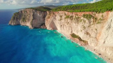 Aerial view of Plakaki Rocks on Zakynthos Island, Ionian sea, Greece. Rocky coastline of Zakynthos Island near Plakaki beach. Ionian Sea with turquoise water and limestone cliffs, Greece.
