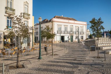 Tavira town central Praca da Republica square at sunny day in Algarve region, Portugal.