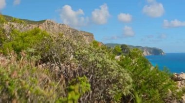 Plakaki Rocks on Zakynthos Island, Ionian sea, Greece. Revealing footage of the Rocky coastline of Zakynthos Island. Ionian Sea with turquoise water and limestone cliffs