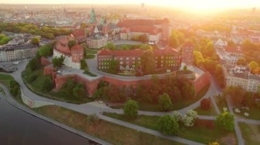 Historic royal Wawel castle in Cracow at sunrise, Poland. Aerial view of the Historical courtyard of the Royal Wawel Castle in morning light. Historic castle in summer in Krakow town