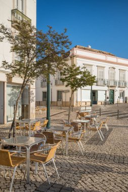 Tavira town central Praca da Republica square at sunny day in Algarve region, Portugal.
