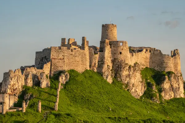 stock image Historic Spis castle at sunrise, Unesco World Heritage Site, Slovakia. Spissky hrad medieval castle. Spis Castle in the town of Spisske Podhradie in Slovakia.