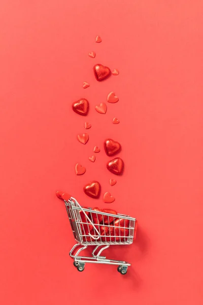 Shopping Trolley Gift Boxes Roses Chocolate Red Hearts Red Background — Stock Photo, Image