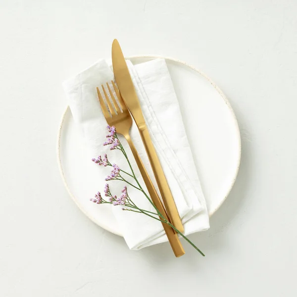 Gold Cutlery Eucalyptus Branches White Plate Napkin Light Grey Background — Stockfoto