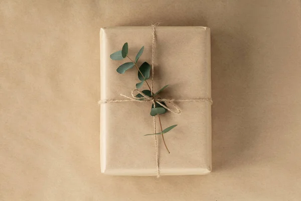 Eco gift zero waste, eco friendly hand made box packaging gift in kraft paper, holiday concept, gift wrapping, eco decor flat lay