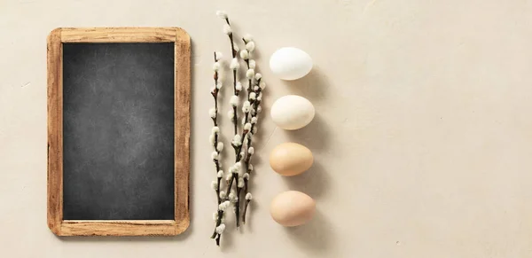 Easter Composition Vintage Easter Decorations Chalk Board Beige Stone Background — Stock Photo, Image