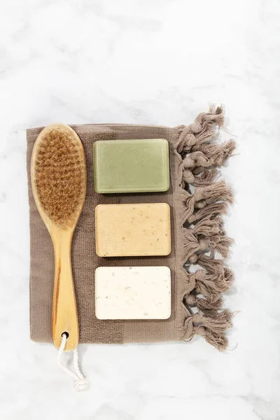 Handmade natural bar soaps, bamboo brush and cotton towel. Ethical, sustainable zero waste lifestyle