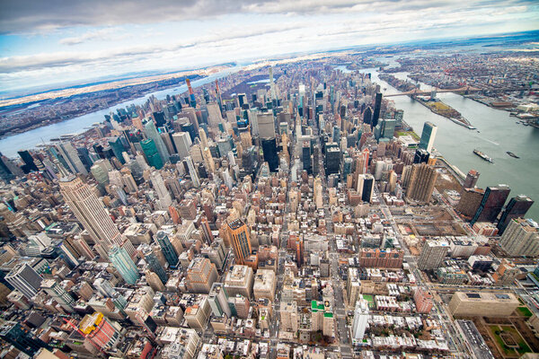 Midtown Manhattan aerial skyline from helicopter in winter season, New York City - USA.