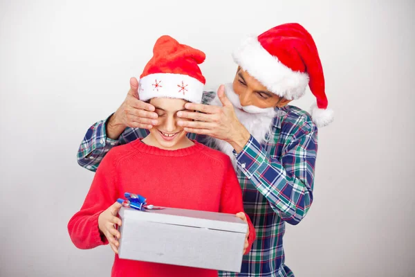 Happy Man Covering His Son Eyes Giving Gift Christmas — Fotografia de Stock
