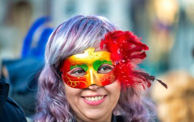 Venice, Italy - February 8th, 2015: People masquerading at the famous Venice Carnival.