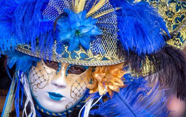 Venice, Italy - February 8th, 2015: People masquerading at the famous Venice Carnival.