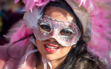 Venice, Italy - February 8th, 2015: People masquerading at the famous Venice Carnival.
