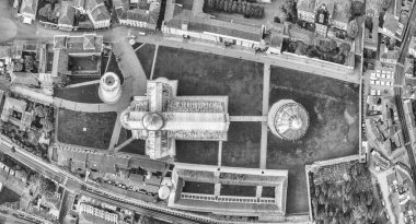 Black and white downward aerial view of Square of Miracles, Pisa. Piazza del Duomo from drone, Italy.