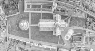 Black and white overhead aerial view of Square of Miracles, Pisa. Piazza del Duomo from drone, Italy.