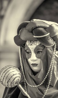 Venice, Italy - February 8th, 2015: People masquerading at the famous Venice Carnival.