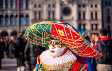 Venice, Italy - February 8th, 2015: People masquerading at the famous Venice Carnival.