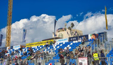 Viareggio, Italy - February 10, 2013: People in the bleachers watch the Carnival Parade show.
