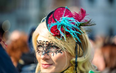 Venice, Italy - February 8th, 2015: People masquerading at the famous Venice Carnival.