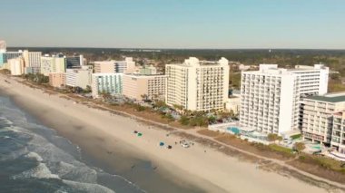 Myrtle Beach from drone, South Carolina. City and beach view at dusk.