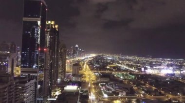 Downtown Dubai at night, panoramic view.