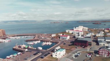 Stykkisholmur aerial city view from drone on a beautiful summer day, Iceland. Slow motion.