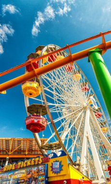 SANTA MONICA, CA - AUGUST 1, 2017: City pier amusement park. The pier is a famous tourist attraction with Luna Park.
