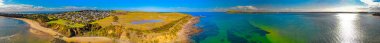 Panoramic aerial view of Phillip Island and San Remo coastline at sunset, Australia