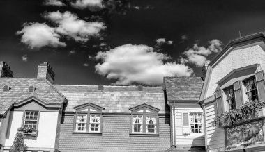 Orlando, FL - February 18, 2016: Colorful wooden homes in the amusement park.