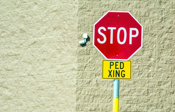 Stop Ped Crossing Signage, white on red.