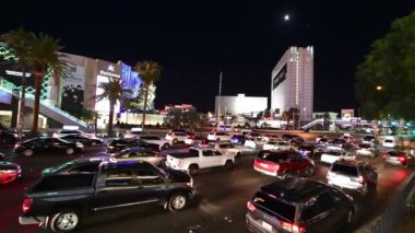 LAS VEGAS, NV - JUNE 30, 2018: Night view of The Strip from city escalator. Las Vegas is the world gambling capital.