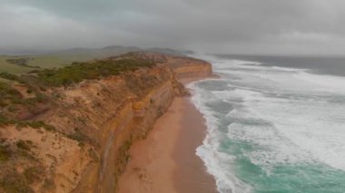 The Twelve Apostles on a stormy afternoon, aerial view.