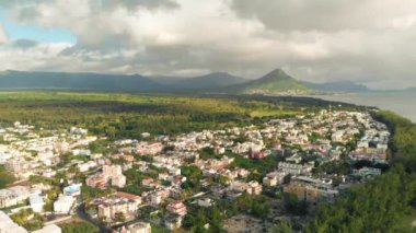 Aerial view of mountains and trees from Flic en Flac Beach, Mauritius Island.