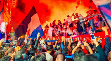 PISA, ITALY - JUNE 15TH, 2016: Celebrations on the night for the soccer team's promotion. People mad with joy in the street.