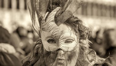 Venice, Italy - February 8th, 2015: People masquerading at the famous Venice Carnival.